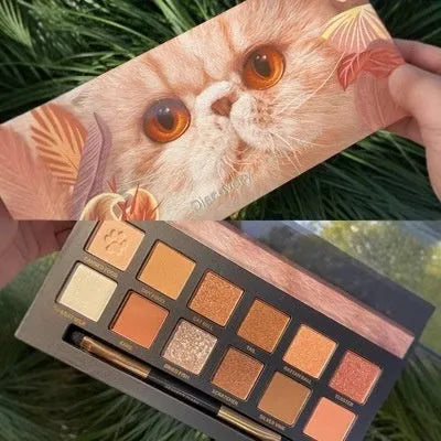 Twelve-colour animal eye shadow palette with themed designs including cat, tiger, fox and leopard patterns