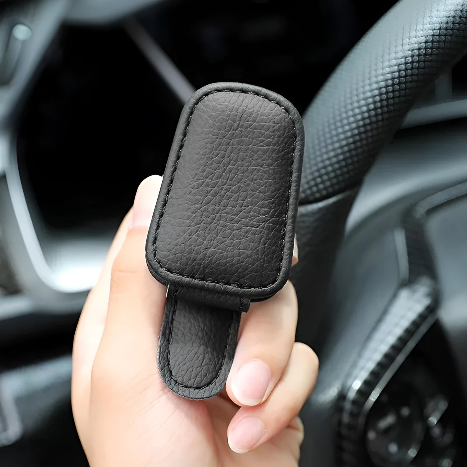 PU leather car sunglasses clip holder attached to a car sun visor