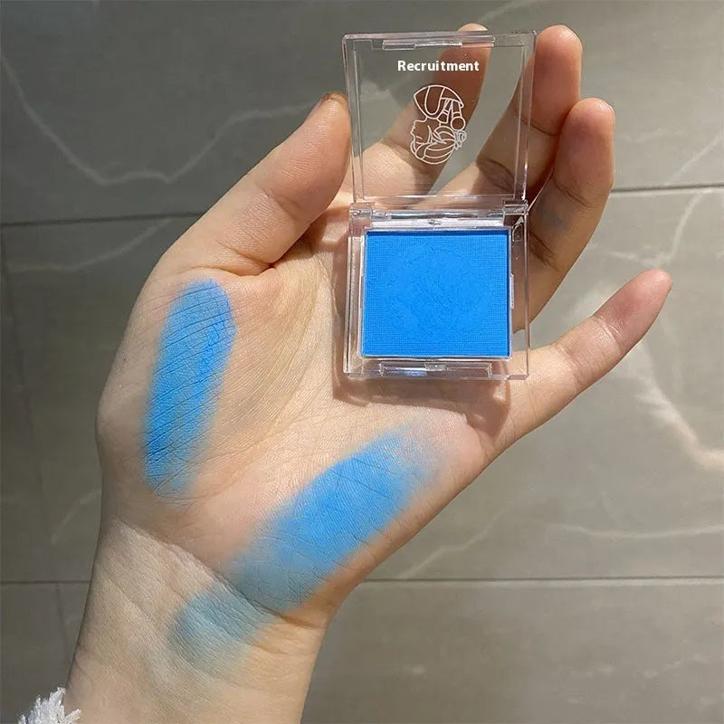 Single pan of matte monochrome eyeshadow in a choice of eight bright colours including yellow, red, green, and blue.