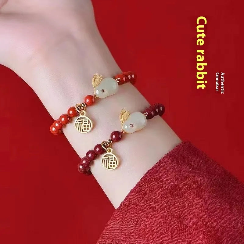 Cinnabar hare bracelet in purple gold sand colour with traditional bead design