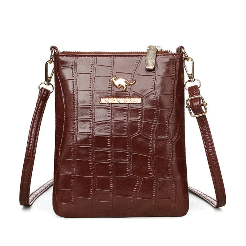 Soft PU leather shoulder messenger bag in a square vertical shape with a file compartment, shown in a floral stone pattern colour.
