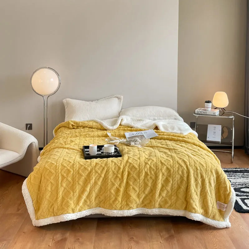 Polyester thermal flannel blanket in tea green colour on a double bed, showing 180x200cm size.