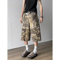 Yellow snake pattern camouflage cropped jeans on hanger