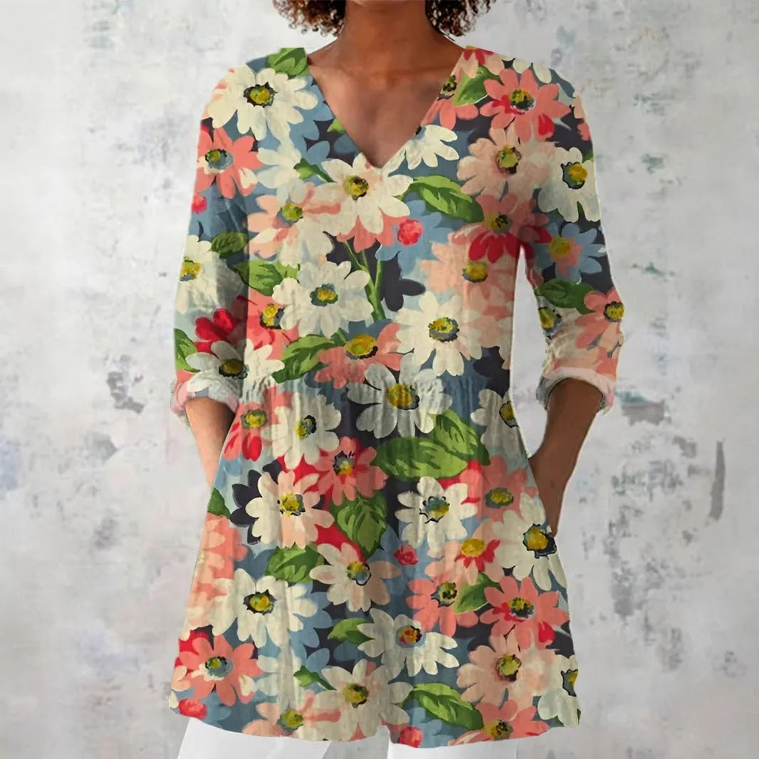 Women's slim fit long-sleeved top with a retro all-over digital print, shown in a selected colour.