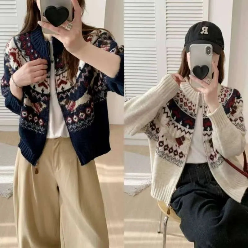 Beige ethnic Jacquard pattern pullover sweater with 3D effect and round neck on a hanger.