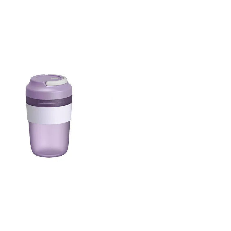 Portable purple rechargeable blender cup with four stainless steel blades, 400ml capacity, shown with USB cable.