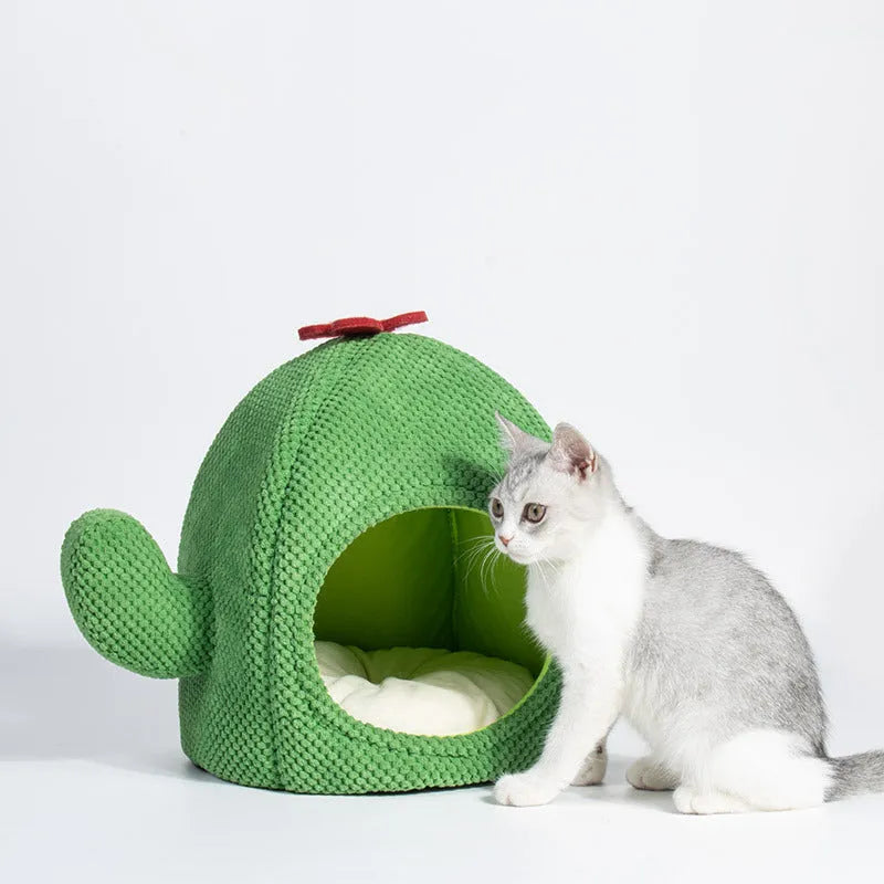 Dark green enclosed cave cat bed for kittens and small dogs, showing cosy nest design.