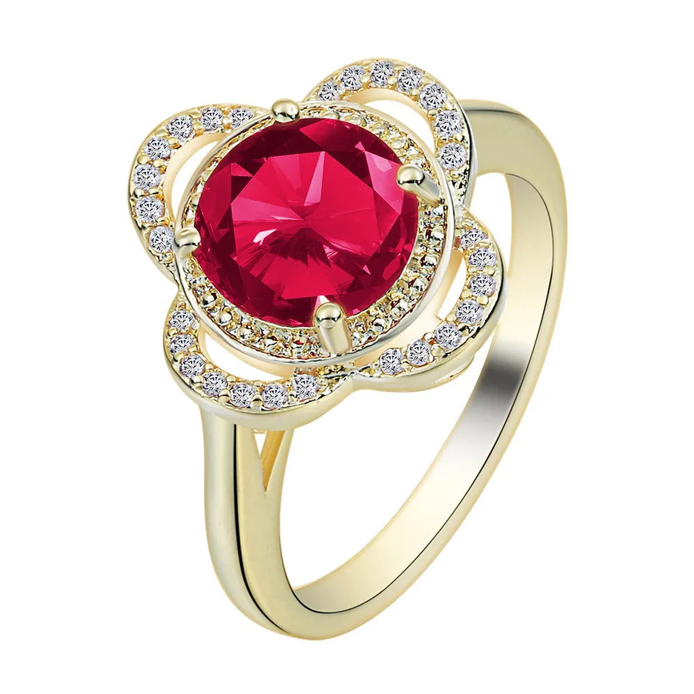 Copper fruit-shaped ring with inlaid zircon stone, shown in colour 10-6-1395.