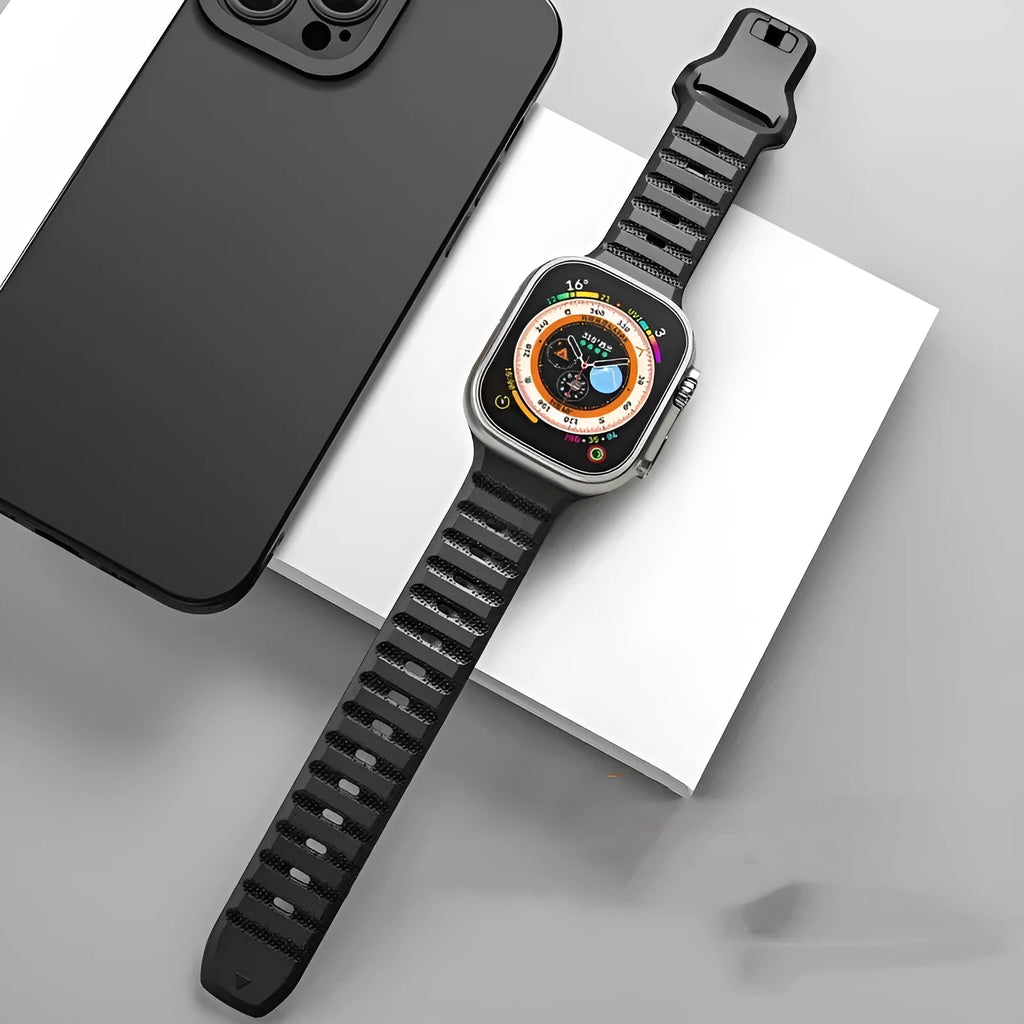 Fluoro rubber replacement strap for Apple Watch in multiple colour options on a watch case.