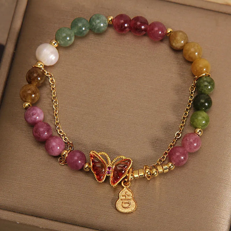 Natural jade coloured agate bracelet with a butterfly gourd design for women.