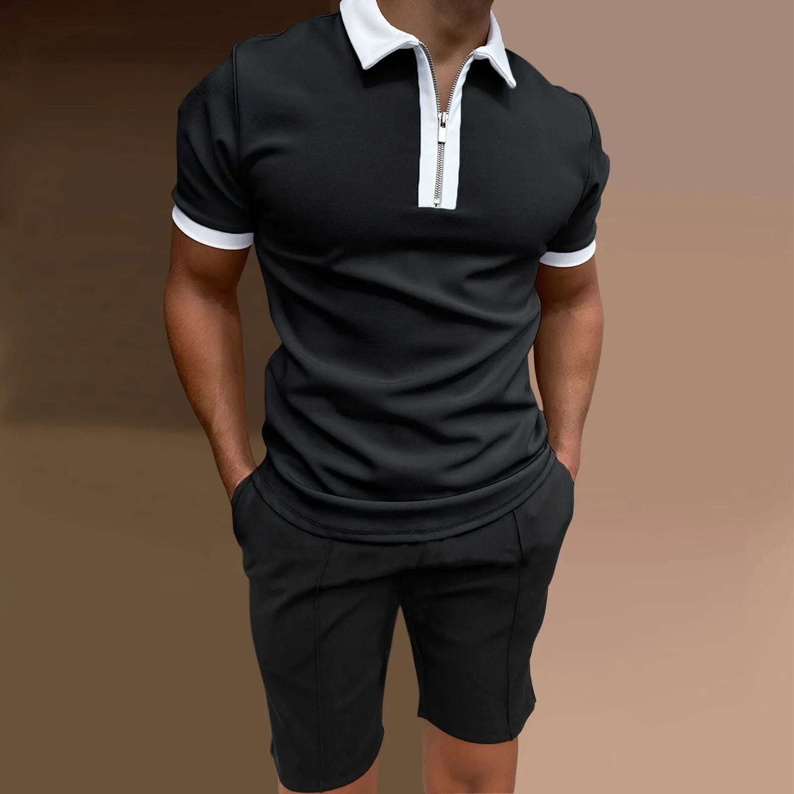 Men's casual printed polyester two-piece set showing short sleeve top and matching shorts