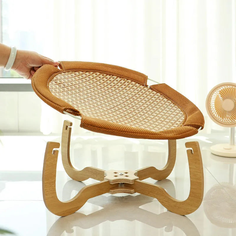 Brown woven rattan pet hammock bed measuring 46cm square with 17.5cm elevation