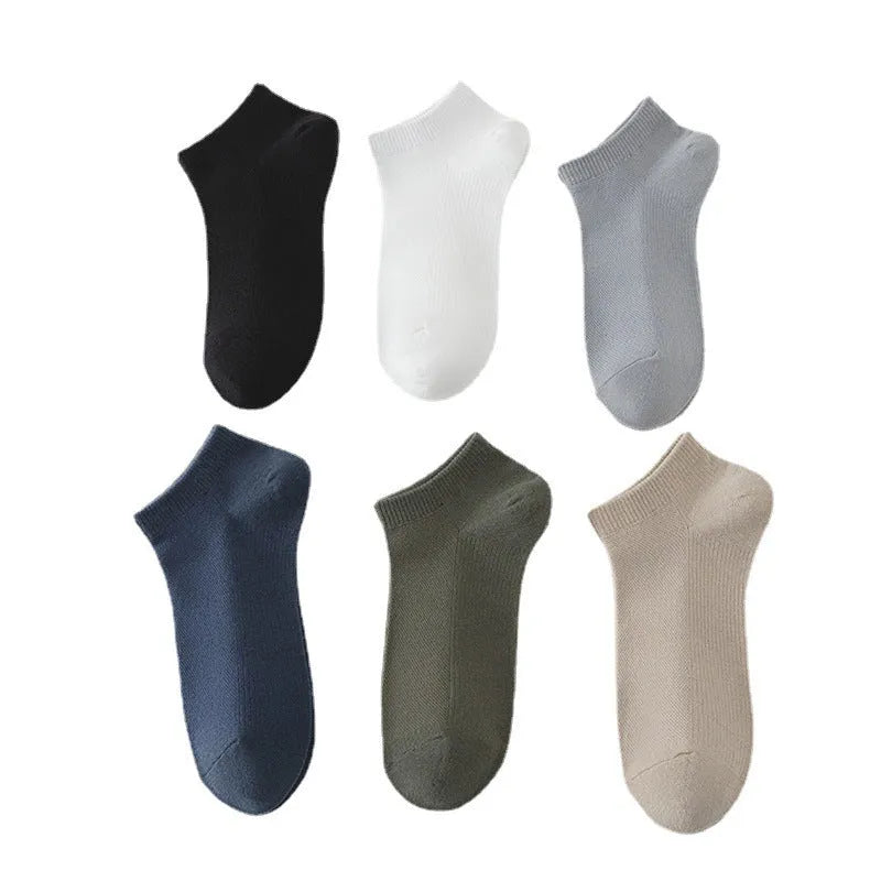Solid colour low-cut polyester boat socks for men in a free size, shown in one of six available colour options.
