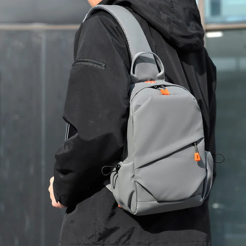 Mens casual single shoulder crossbody bag in polyester material, shown in black and grey colour options