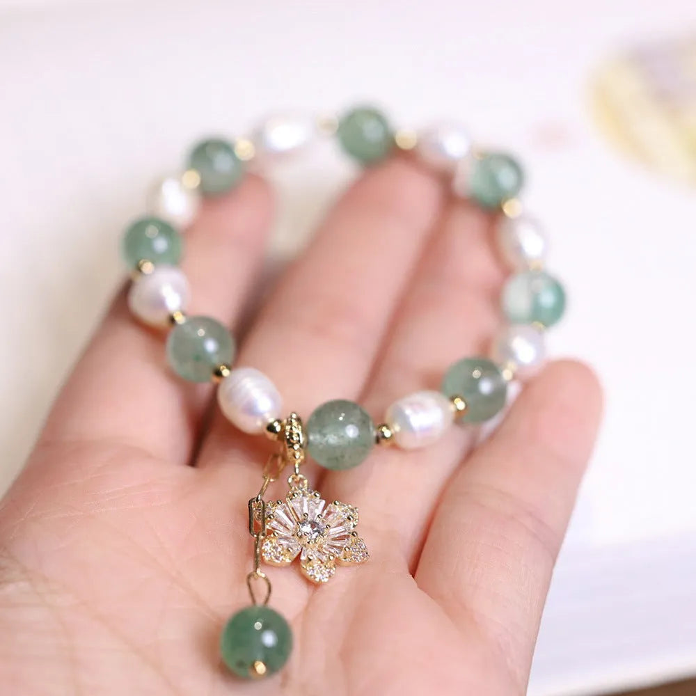 Green handmade freshwater pearl bracelet with strawberry pearls and Chinese knot design