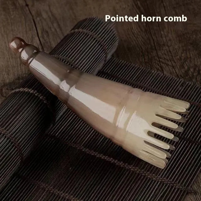 Black buffalo horn dual-ended comb with wide teeth and pointed tube for meridian massage