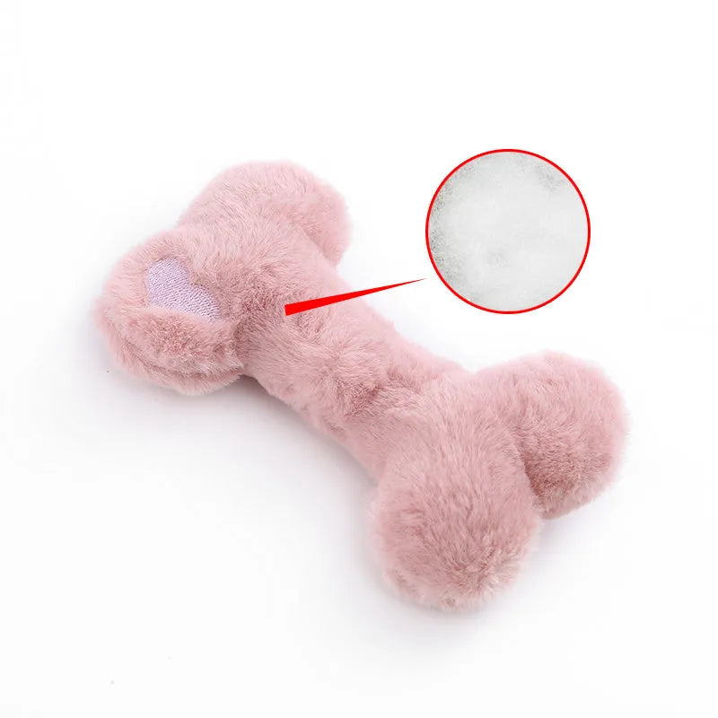 Blue squeaky plush love bone dog toy on a white background