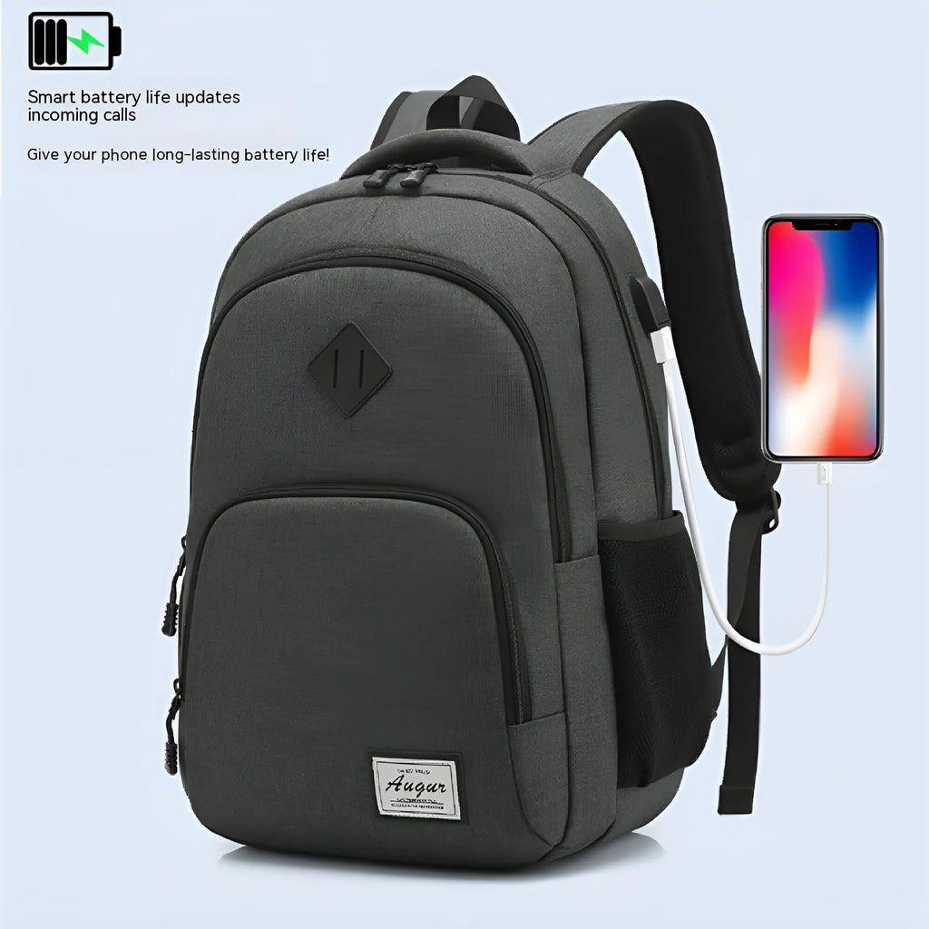Grey and black lightweight backpack with USB charging port showing 32x15x46cm dimensions.