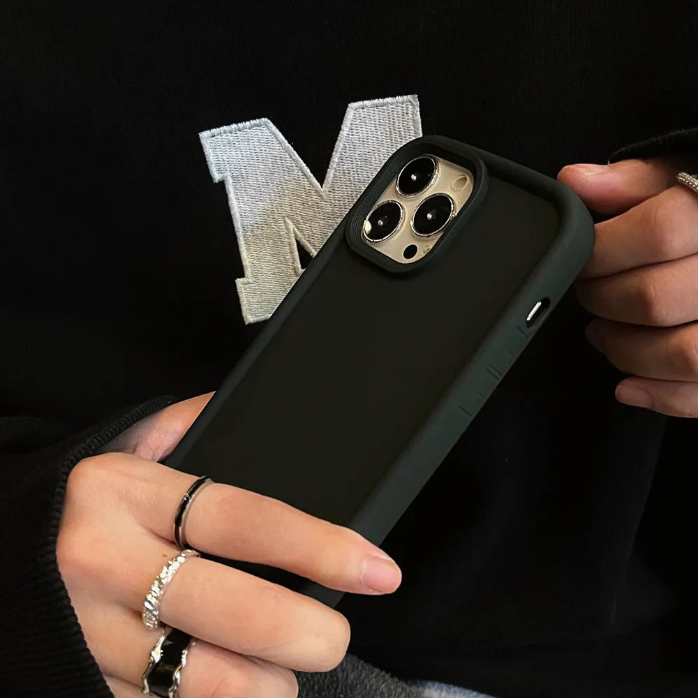 Frosted skin-feel silicone iPhone case showing textured surface and full-cover design
