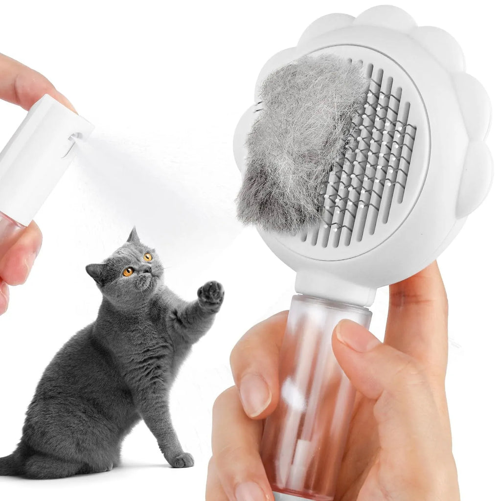 Self-cleaning spray cat brush with release button in grey, green, or pink colours for pet grooming