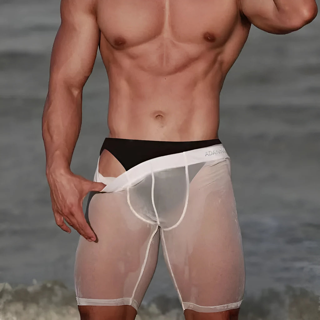 Men's black seamless knitted mesh home shorts laid flat showing hip lift design