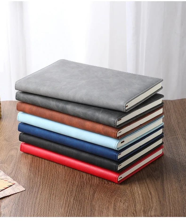 A5 size notebook with PU leather cover in various colours, showing wood-free paper inside.
