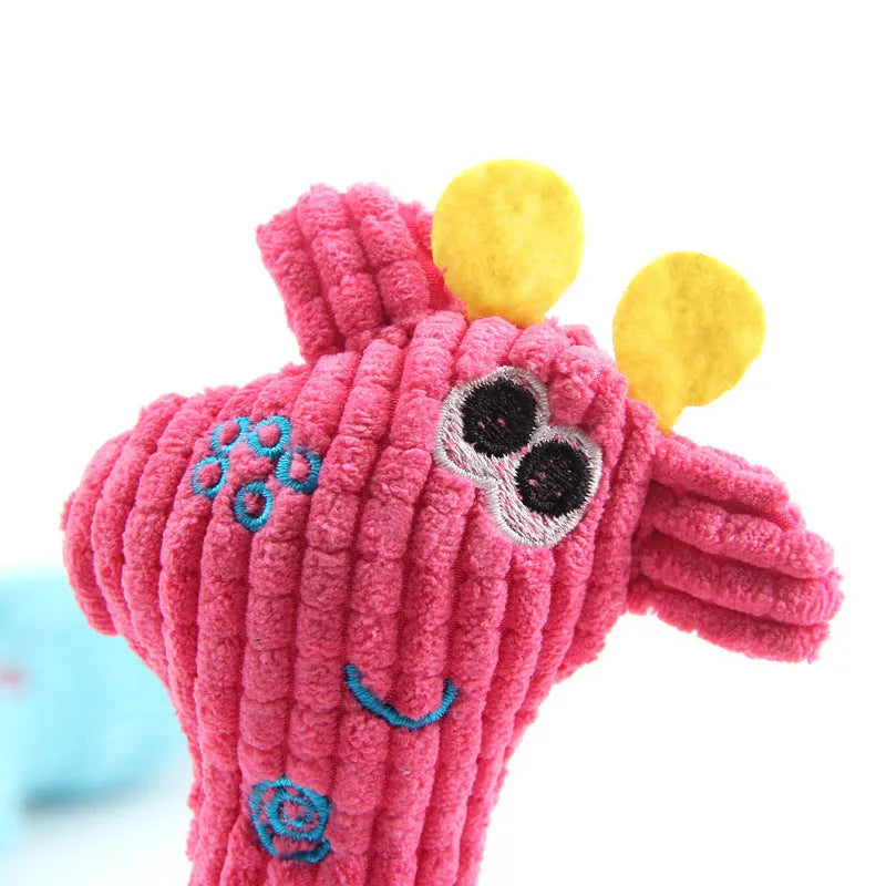 A blue deer-shaped plush dog toy with a corn grain textured surface.