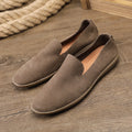 Handmade men's low-top leather shoes in grey with a rubber wedge sole and breathable cowhide lining