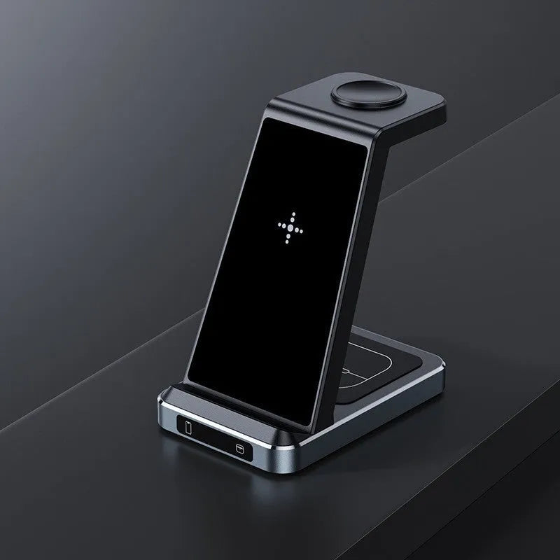 X2 three-in-one wireless charger in black charging a phone, watch, and earbuds