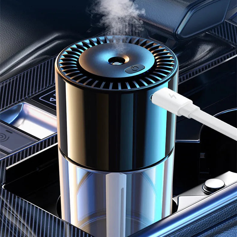 USB-powered AI intelligent spray perfume humidifier with glass seat on desk.