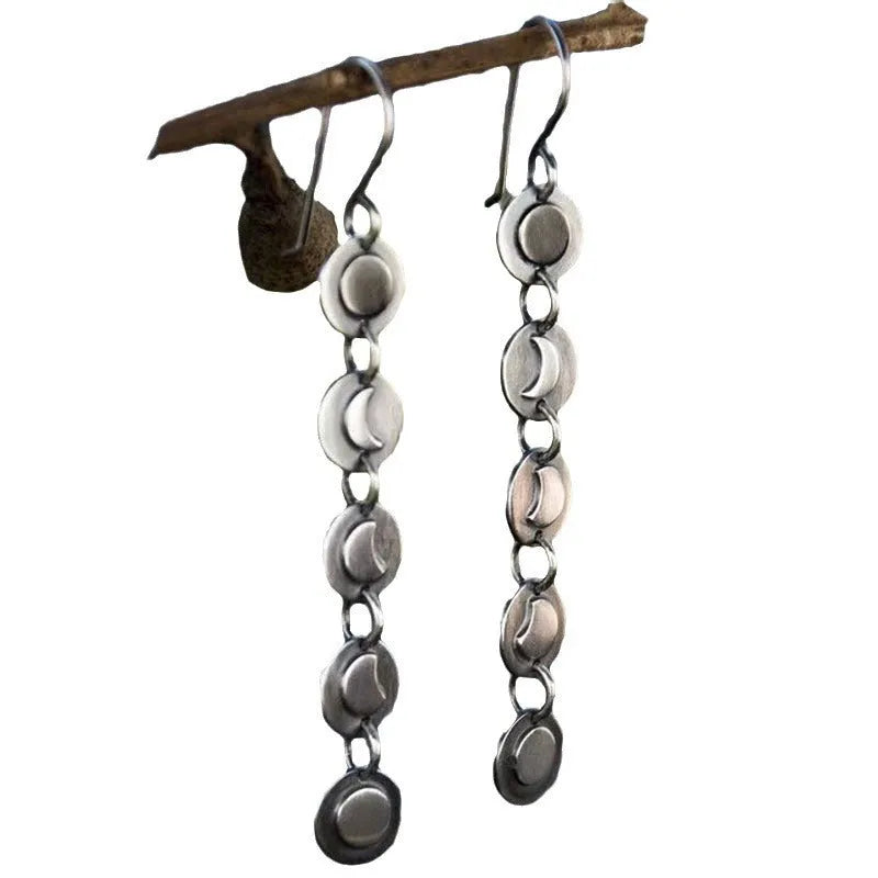 Geometric disc handmade moon long earrings in silver colour on alloy base, drop dangle style for women