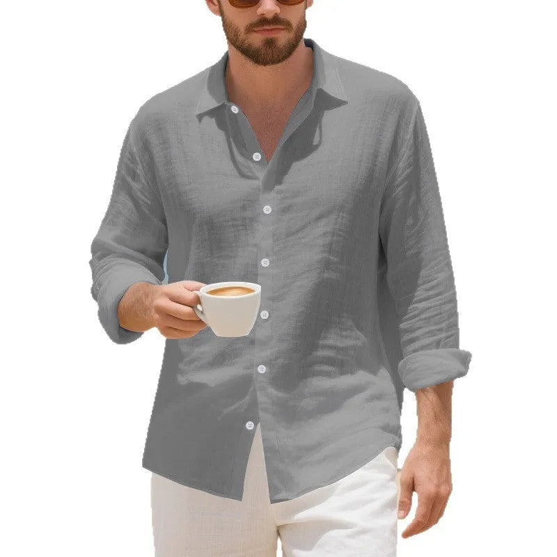 Man wearing a loose-fit linen casual shirt in a light blue colour, showcasing the relaxed style.