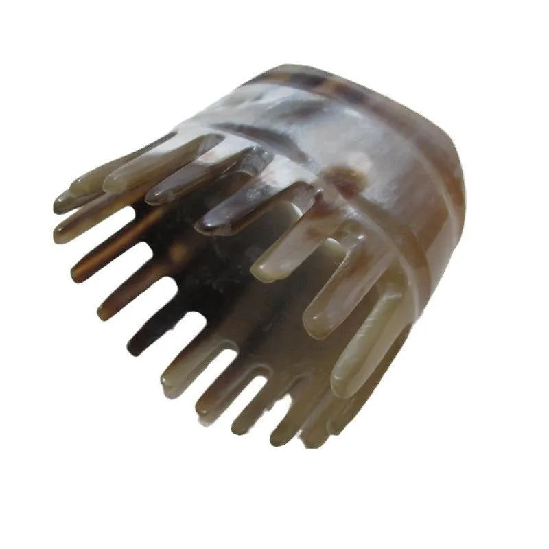 Black buffalo horn dual-ended comb with wide teeth and pointed tube for meridian massage