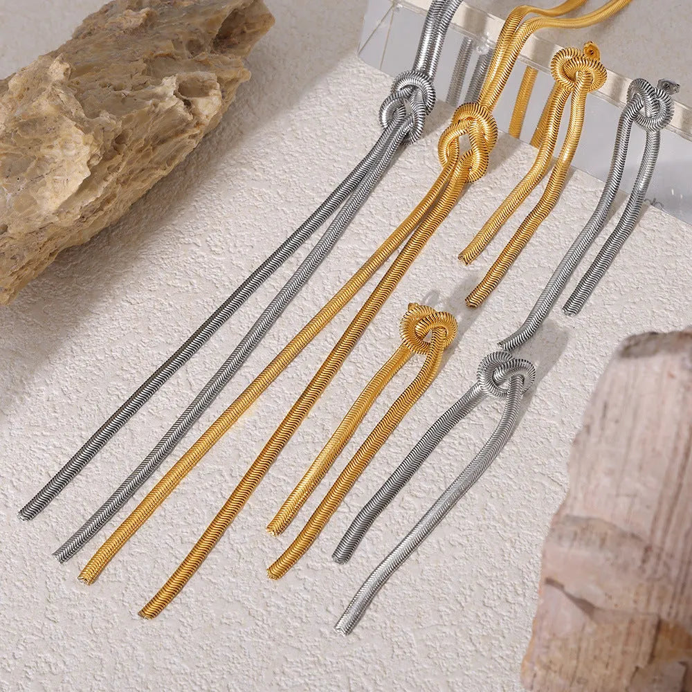 Gold electroplated titanium steel necklace with tassel pendant and matching earrings set