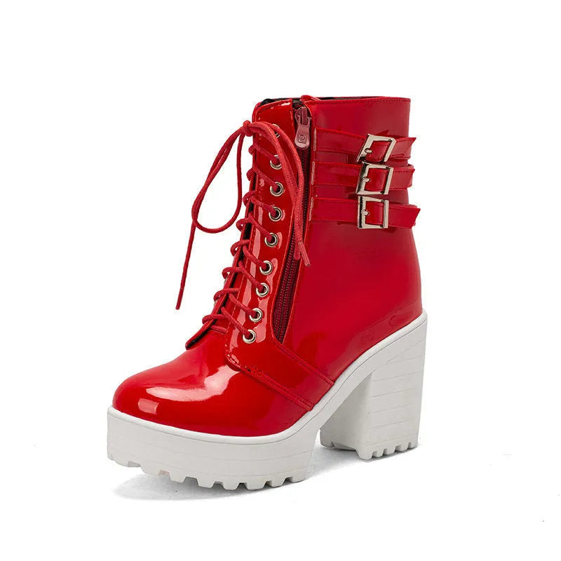 Women's black chunky heel ankle boots with lace-up front and round toe.