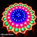 Outdoor Christmas string lights with decorative bulb shapes including peacock, heart, sunflower, and star designs