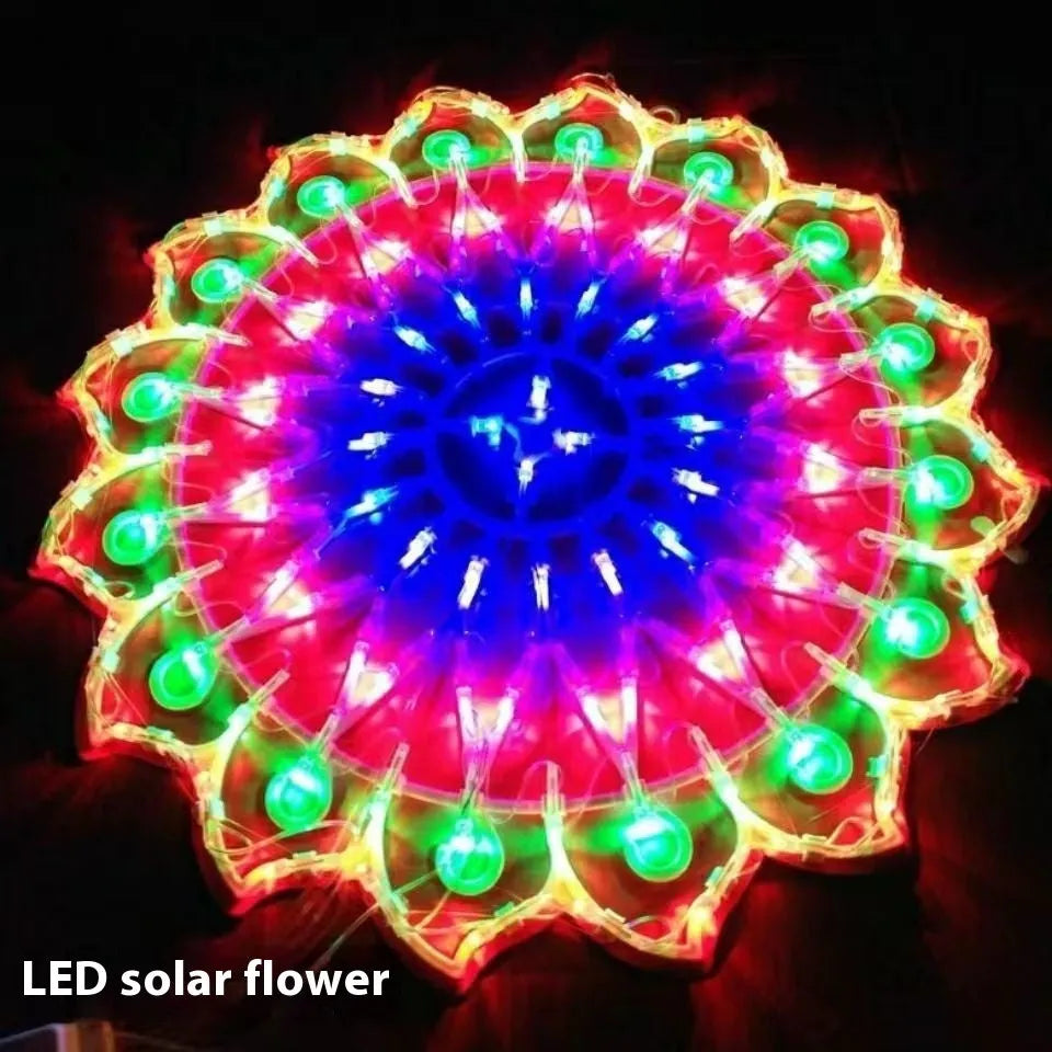 Outdoor Christmas string lights with decorative bulb shapes including peacock, heart, sunflower, and star designs