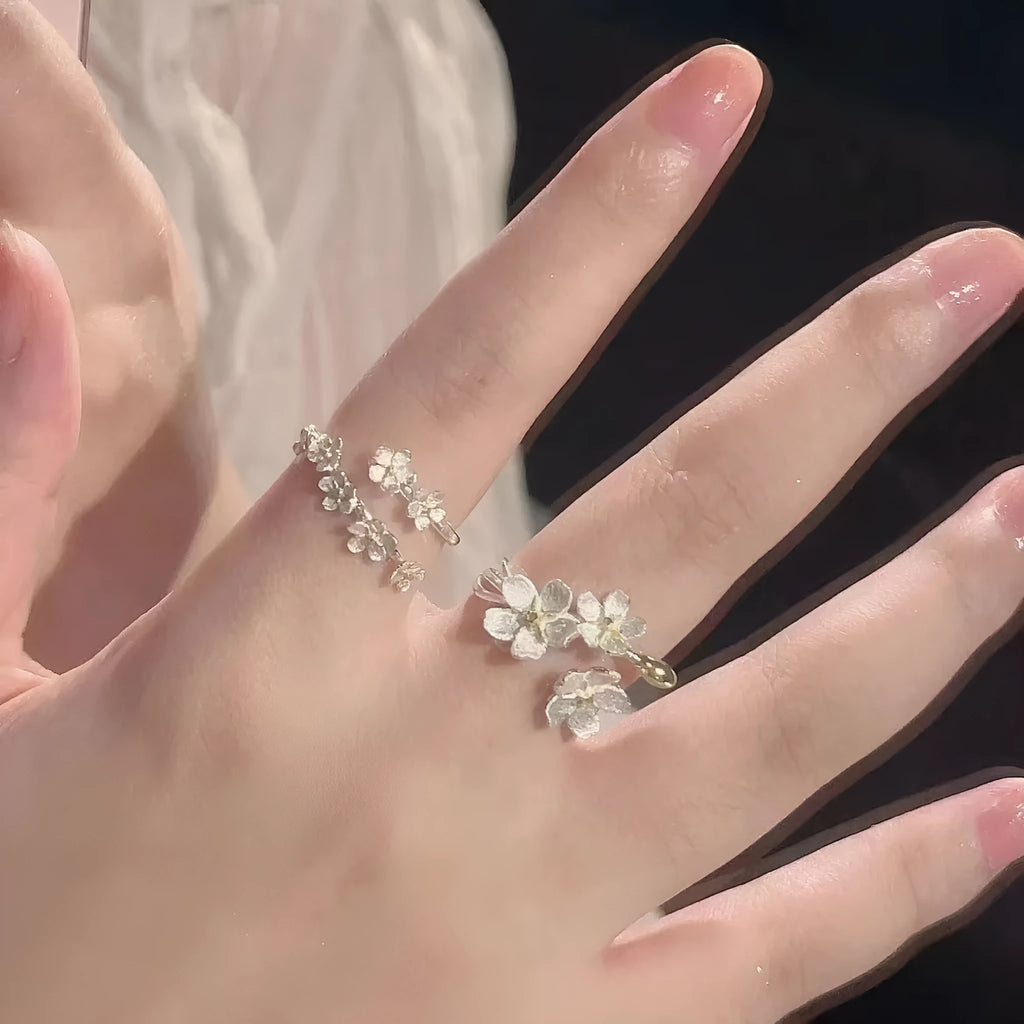 Three-dimensional jasmine flower ring in zinc alloy with open mouth adjustable design