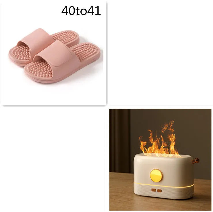 Black simulation flame USB humidifier with colour changing LED light on a desktop
