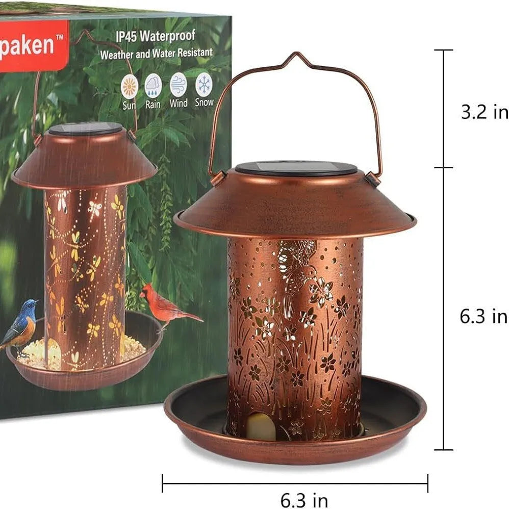 Solar-powered iron art bird feeder with hummingbird pattern and integrated LED light for gardens