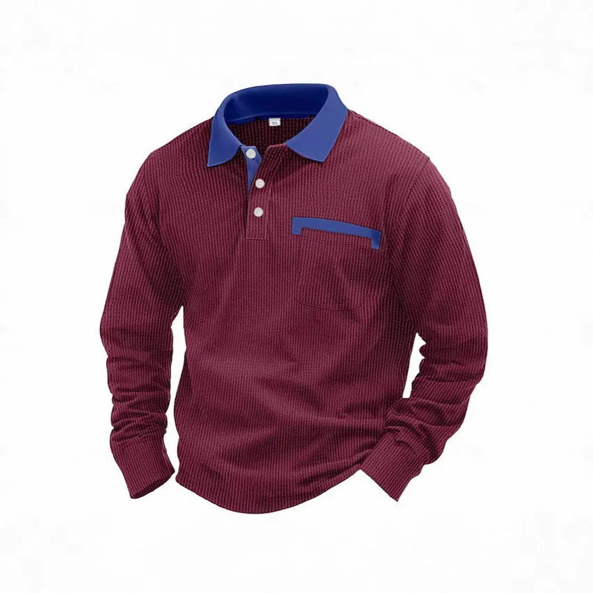 A man wearing a long-sleeved waffle knit polo shirt in a solid colour with a loose, retro fit.