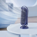 White USB tower fan with humidifier and remote control on a desk