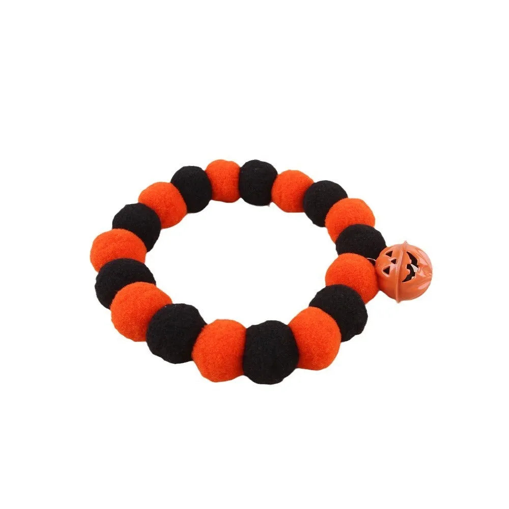 Orange Halloween pumpkin costume collar for cats with adjustable strap in sizes S, M, L.