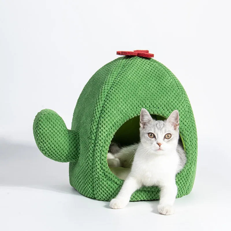 Dark green enclosed cave cat bed for kittens and small dogs, showing cosy nest design.