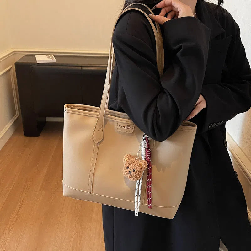 Niche Fashion retro shoulder tote bag in horizontal rectangular shape with stitched seams, PU material, available in multiple colours