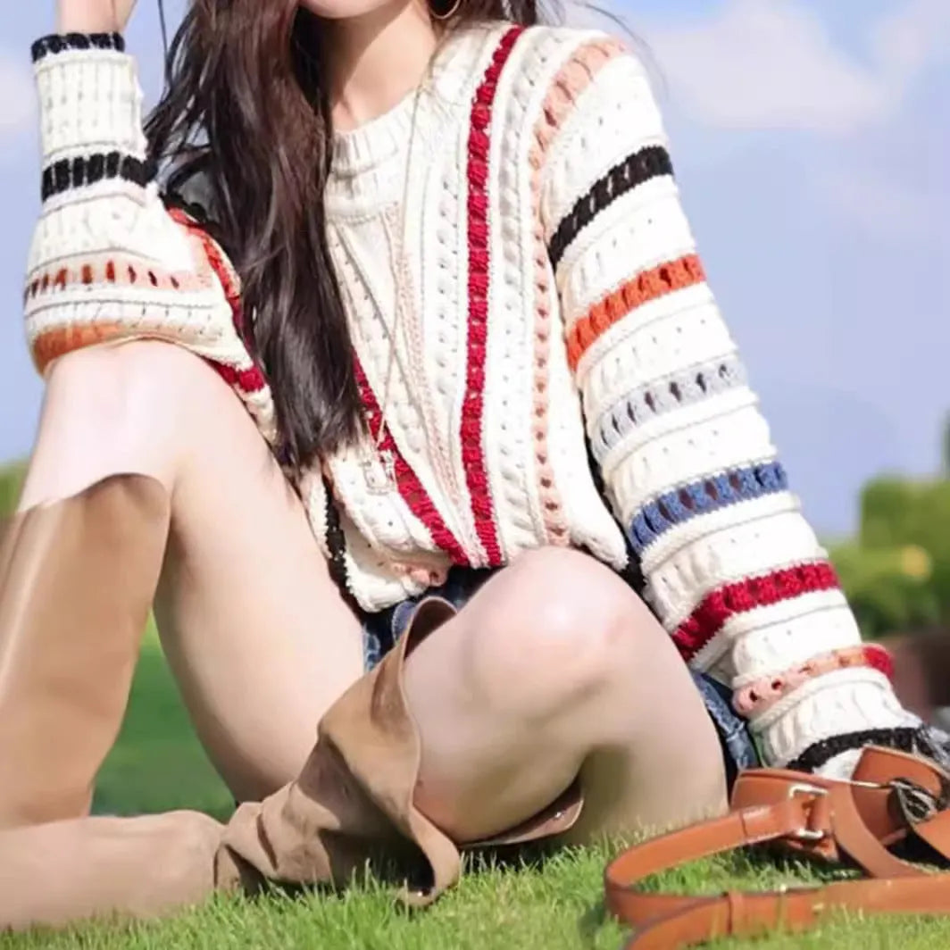 Retro rainbow striped hollow knit sweater with batwing sleeves and round neck in loose fit