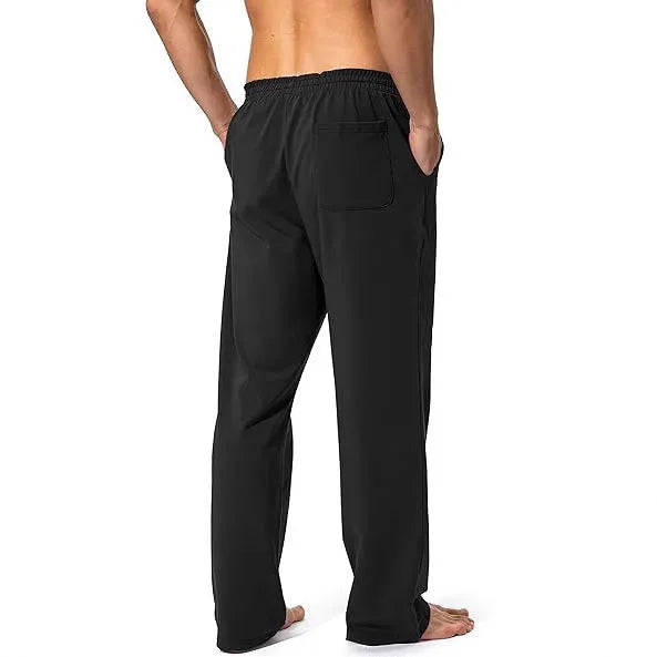 Man wearing loose grey casual quick-dry trousers for sports leisure