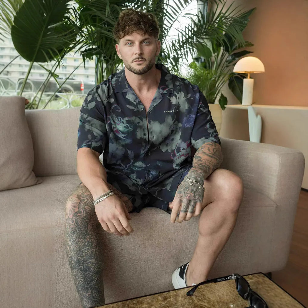 Men's loose fit short sleeve top with floral printed pattern in polyester fabric