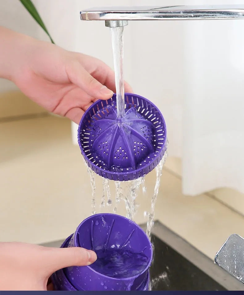 Purple USB rechargeable electric citrus juicer with detachable cone and pulp filter.