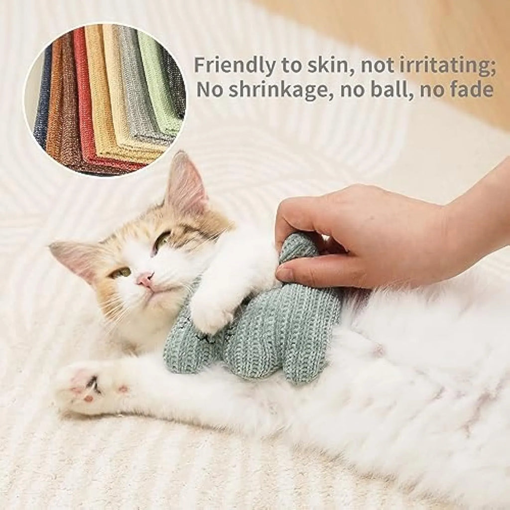 Cyan plush cat toy with bell and catnip, shown next to a light coffee coloured version.
